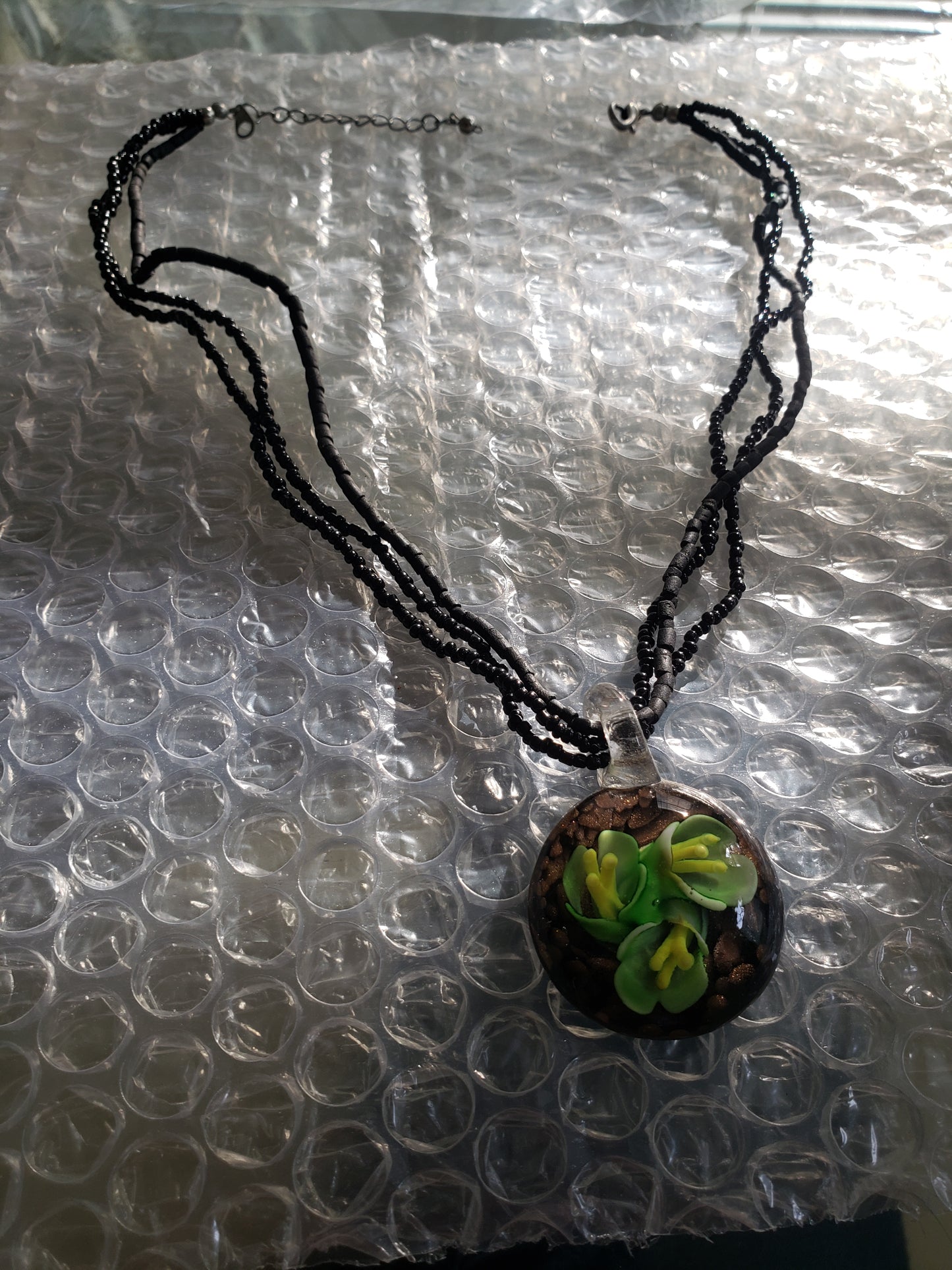 Glass suspended pendant