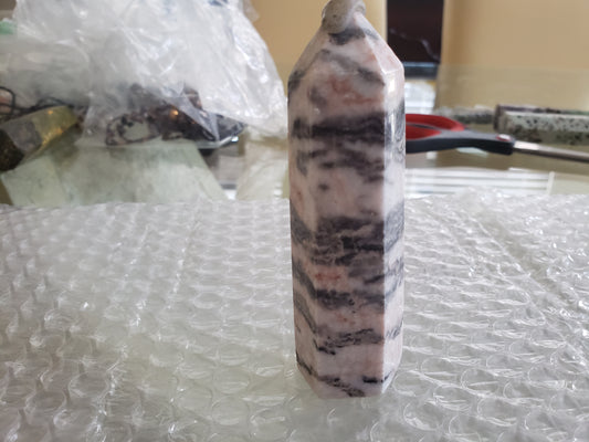 Pink and gray marble crystal tower
